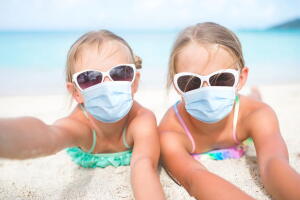 Kids have a lot of fun at tropical beach