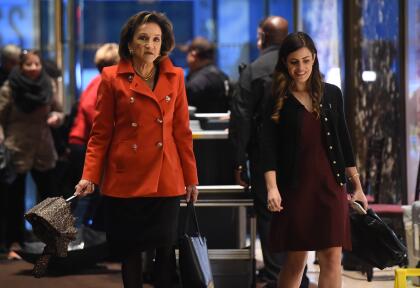 Marion C. Blakey,President and Chief Executive Officer of Rolls-Royce, flanked by a presidential transition team aide Madeleine Westerhout, arrives at Trump Tower during another day of meetings with President-elect Donald Trump on November 29, 2016 in New York. / AFP / TIMOTHY A. CLARY (Photo credit should read TIMOTHY A. CLARY/AFP/Getty Images)