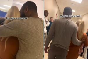 Padres conmueven al recorrer el "pasillo del honor" con su bebé en brazos