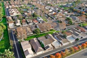 Aerial view of middle class suburban neighborhood with houses next to each other in Irvine