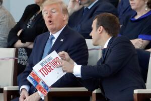 French President Emmanuel Macron and US President Donald Trump attend the traditional Bastille Day military parade on the Champs-Elysees in Paris