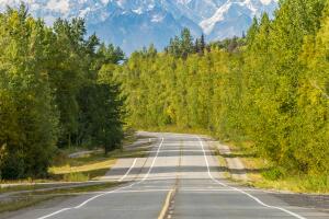 Empty road with mount Denali (mckinley) in the background, Alaska
