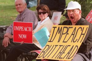 Unidentified protestors demanding the impeachment