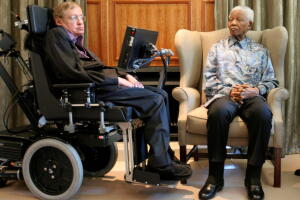 FILE PHOTO: Former South African President Mandela meets theoretical physicist professor Hawking at Mandela's Foundation office in Johannesburg