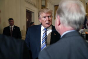 President Donald Trump speaks with Health and Human Services Secretary Tom Price, right, during a "Made in America," product showcase featuring items created in each of the U.S. 50 states, at the White House, Monday, July 17, 2017, in Washington. 