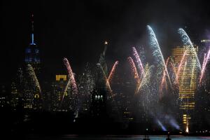 A fireworks display is set above of New