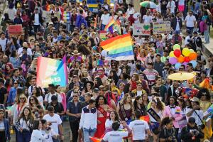 Participants take part in the gay pride parade in Quito
