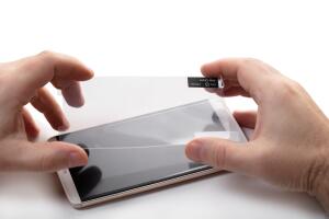 sticking a protective on mobile phone