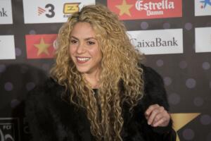 Shakira y Piqué con Milan y Sasha en una entrega de premios.