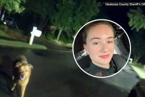 La agente Devon Miller encontró al perro, quien la guió hasta la mujer caída en el vecindario.