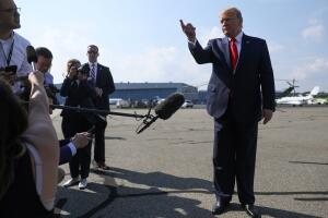 U.S. President Trump boards Air Force One at Morristown Municipal Airport in Morristown, New Jersey