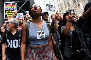Anti-racism protesters shout during protests in front of Trump Tower in New York City