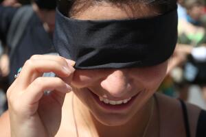 Members of a women's collective protest outside Chilean Consulate in Sao Paulo