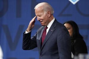 Former Vice President Joe Biden salutes supporters after the sixth 2020 U.S. Democratic presidential candidates campaign debate at Loyola Marymount University in Los Angeles