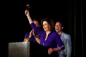 U.S. House Speaker Nancy Pelosi holds a rainbow-colored gavel during the Alice B. Toklas Club Annual Pride Breakfast in San Francisco
