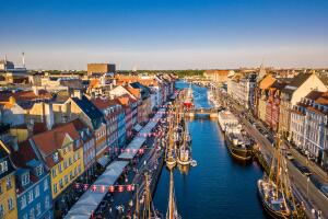 Copenhagen, Denmark. New Harbour canal and entertainment famouse street. Aerial shoot view from the top.