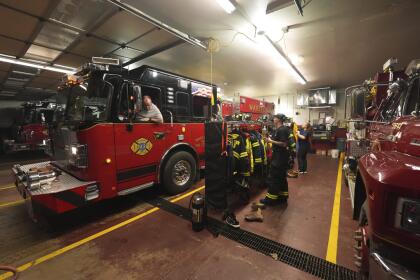 Waretown Volunteer Fire Company firefighters prepare to respond to a wildfire on Tuesday, April 22, 2025, in Waretown, N.J. (AP Photo/Chris Szagola)