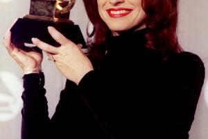 Gloria Estefan holds up the Grammy Award she won 0