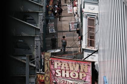 PHILADELPHIA, PENNSYLVANIA - JULY 19: People gather on a street overtaken by heroin users in Kensington on July 19, 2021 in Philadelphia, Pennsylvania. According to data from the US Centers for Disease Control and Prevention's National Center for Health Statistics, over 93,000 people died from a drug overdose last year in America. These numbers and the continued rise in opioid use made 2020 the deadliest year on record for drug overdoses. Officials have said that the increase is being driven by the lethal prevalence of fentanyl and stressed Americans due to the Covid pandemic. Kensington, a neighborhood in Philadelphia, has become one of the largest open-air heroin markets in the United States. (Photo by Spencer Platt/Getty Images)