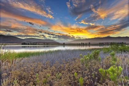 Sunrise over Otay Lakes in Chula Vista, CA. HDR image taken with graduated filters, and with the camera mounted on a tripod.