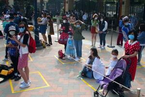 APTOPIX Virus Outbreak China Disneyland