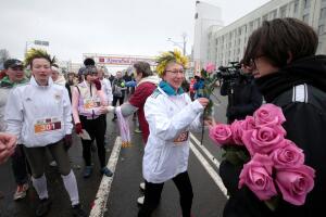 Women participate in the "Beauty Run" to mark International Women's Day in Minsk