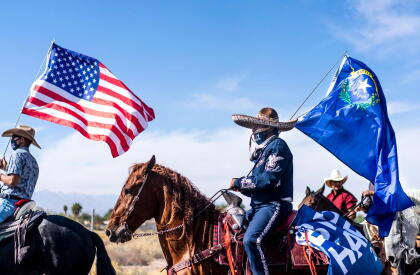LAS VEGAS, NEVADA - OCTOBER 24, 2020: Latinx supporters attend a Biden/Harris Nevada Hispanic Legislative Caucus and supporters on horseback rally at the Walnut Community Center's early voting location in Las Vegas, Nevada on Saturday, October 24, 2020. (Photo by Melina Mara/The Washington Post via Getty Images)
