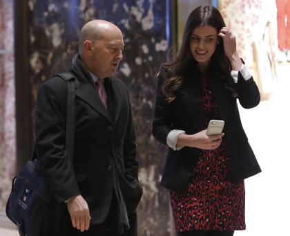 Retired Admiral James Stavridis (L), dean of Fletcher School at Tufts University is escorted by Madeleine Westerhout as he arrives at Trump Tower on December 8, 2016 in New York. / AFP / Dominick Reuter (Photo credit should read DOMINICK REUTER/AFP/Getty Images)