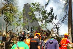 CORRECTION Philippines Military Plance Crash