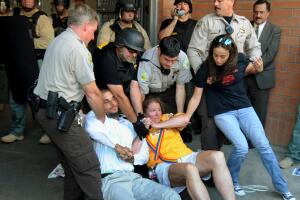Sheriff's deputies detain protesters who