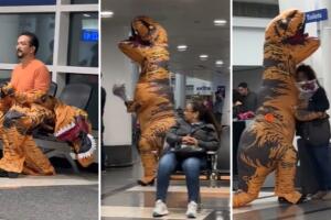 hombre_disfraz_dinosaurio_esposa.jpg