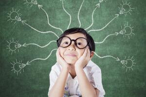 Thoughtful student with branching light bulb
