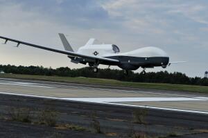 The MQ-4C Triton unmanned aircraft system prepares to land at Naval Air Station Patuxent River
