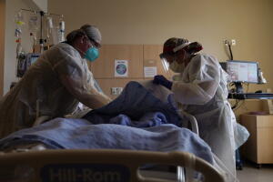 Virus Outbreak-US Surge