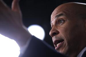 Democratic presidential candidate Senator Cory Booker speaks to news media after the fifth 2020 campaign debate at the Tyler Perry Studios in Atlanta, Georgia