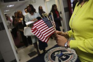 Immigrants Sworn In As American Citizens At Naturalization Ceremony