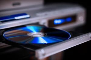 DVD disc inserting to player