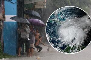 Niños juegan en una calle inundada por las lluvias provocadas por la tormenta tropical Melissa en Santo Domingo, República Dominicana, el viernes 24 de octubre de 2025.