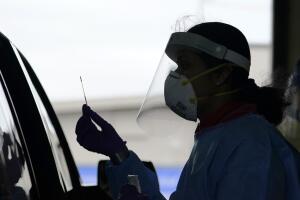 Virus Outbreak US Surge