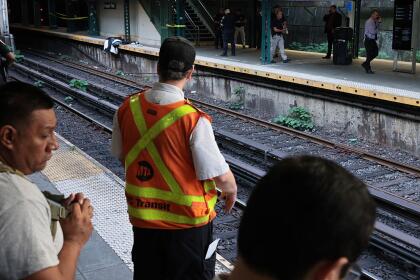 NEW YORK, NEW YORK - JULY 30: (EDITOR'S NOTE: Image depicts death.) (EDITOR'S NOTE, Image contains graphic content.) NYPD officers investigate the scene of a man hit by a train at the Prospect Park subway stop on July 30, 2025 in the Prospect Lefferts Gardens neighborhood of the Brooklyn borough in New York City. (Photo by Michael M. Santiago/Getty Images)