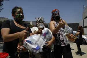 Virus Outbreak Mexico Wrestlers