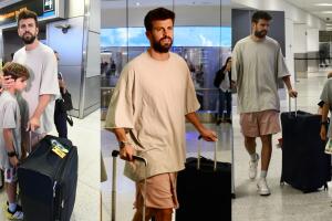 Piqué parecía proteger a sus hijos de los paparazzi a su llegada al aeropuerto de Miami este 19 de junio.