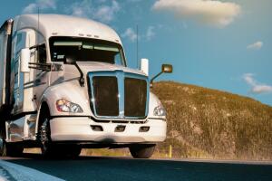 cargo trailer on a highway in the middle of the day. concept of parcel and freight transport.