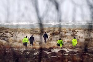 Police Investigators Search Long Island Beach Area After An Additional Bodies Were Found