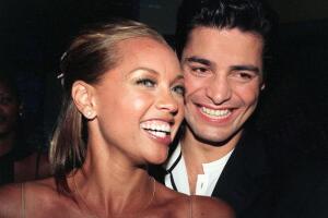 Puerto Rican singer Chayanne (R) smiles together w