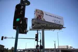 Vandalized California Billboard Criticizes ICE Detention Of Children