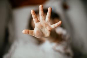 Girl making stop gesture