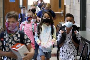 Virus Outbreak Texas Schools