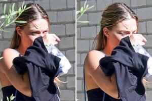 Margot Robbie saliendo de casa Cara Delevingne (2).jpg