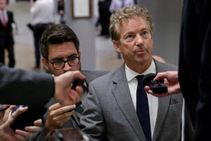 Senator Rand Paul (R-KY) speaks to reporters as he arrives for a vote on Capitol Hill in Washington